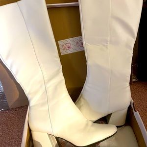 White knee high boots